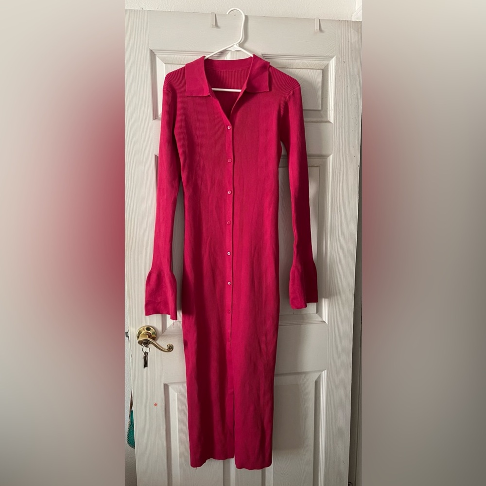 Pink trumpet sleeve sweater dress with buttons and front/ middle slit